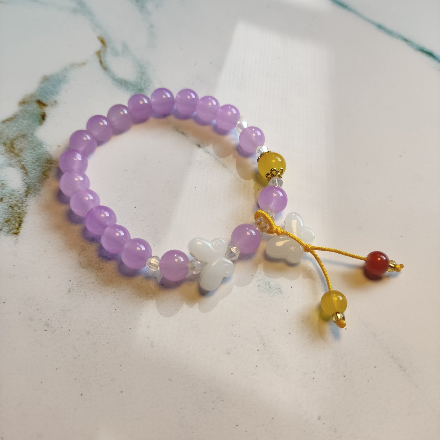 White butterfly purple bracelets